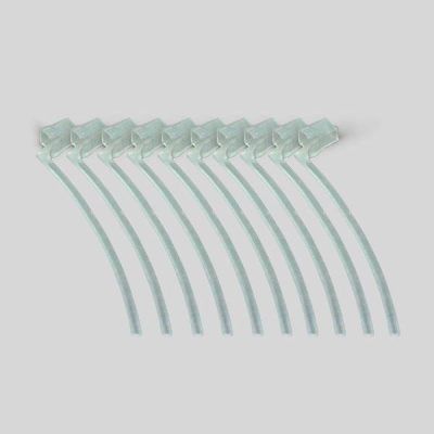 Eight Concha Lock transparent plastic cable ties are neatly arranged in a slightly curved row on a plain light gray background.